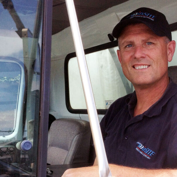 on site shredding service - loading paper bins onto truck