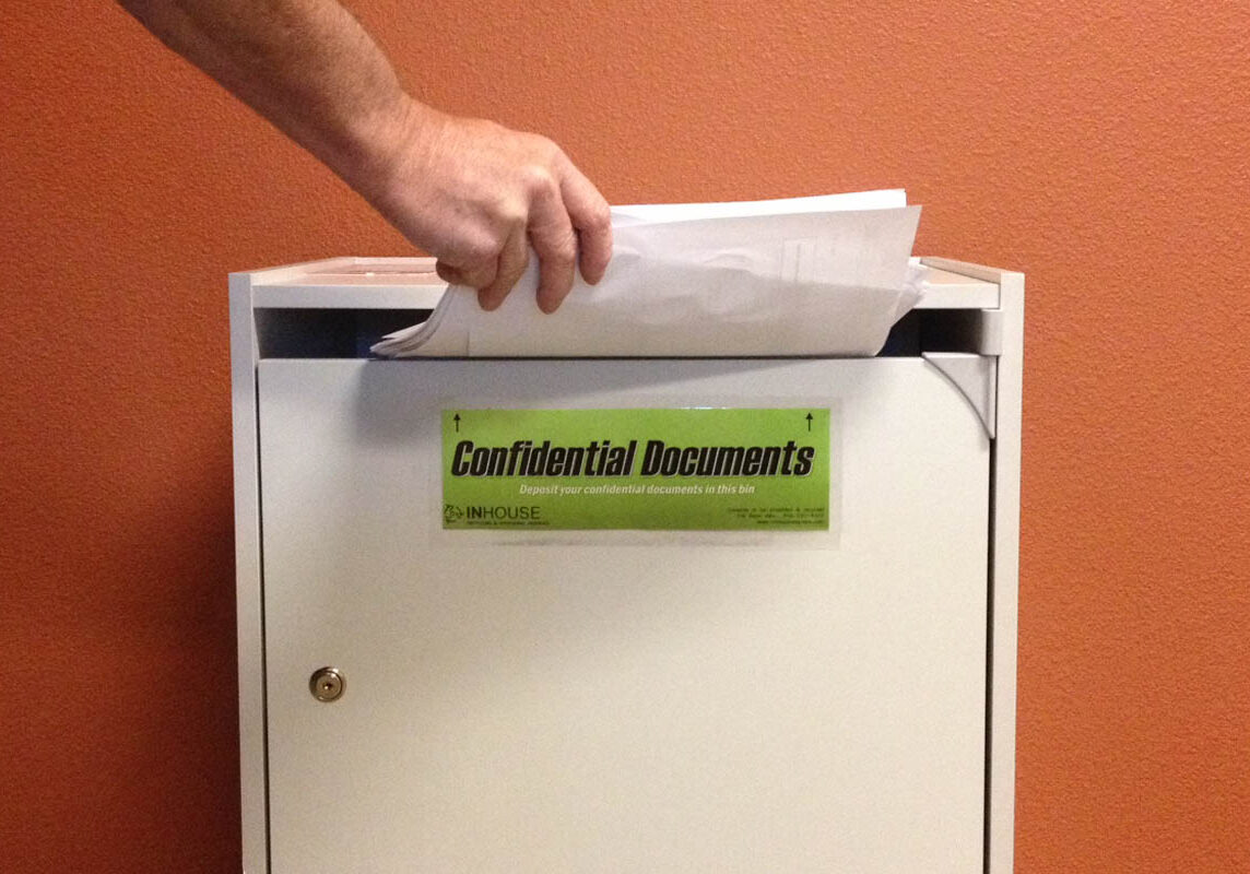 on site shredding service - deposit documents into shredding bin on site shredding service - deposit documents into shredding bin