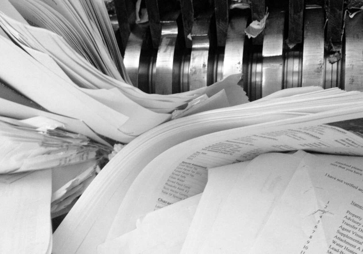 documents being shredded on site in a mobile shredding truck